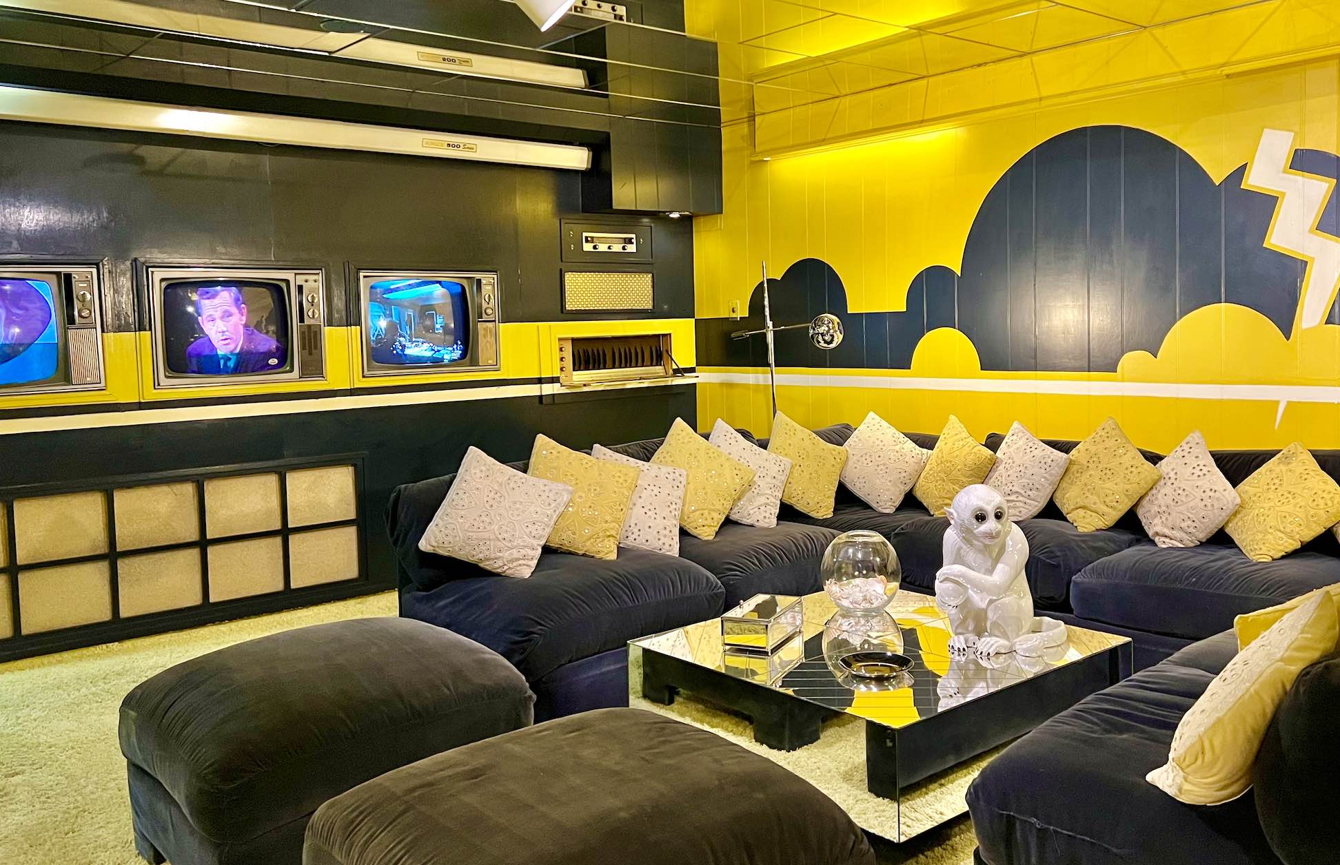 Elvis's TV Room...pure unadulterated glitz in canary yellow, black and white!