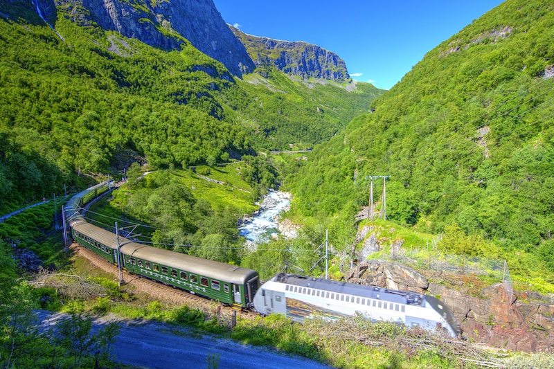 The Flamselvi River follows the train tracks amid spectacular scenery.